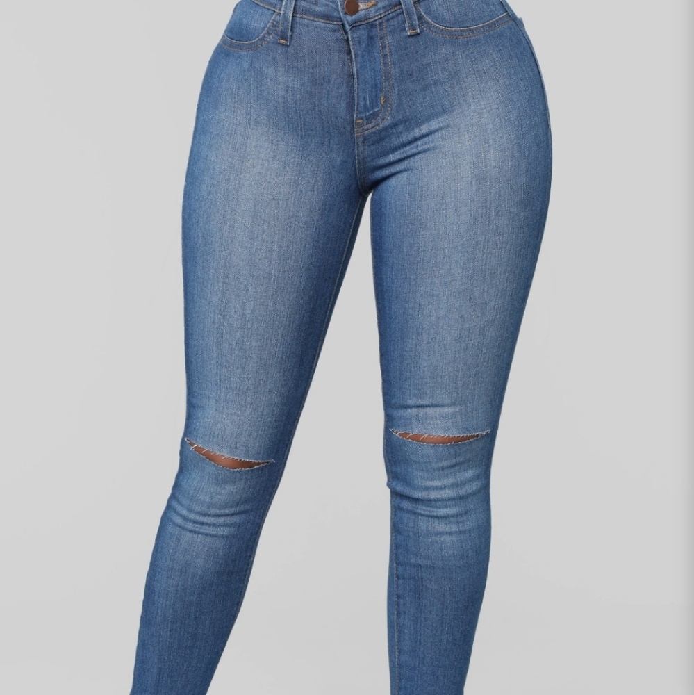 NWT Medium wash stretch jeans with knee slits